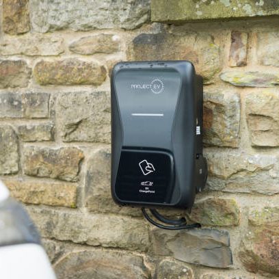 EV charger fitted to the exterior wall of house